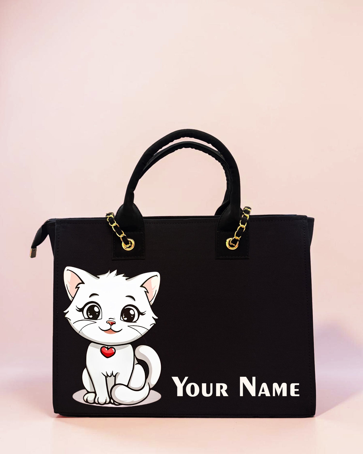 Personalized black tote bag featuring cute white kitty illustration and custom name print on a pastel background.