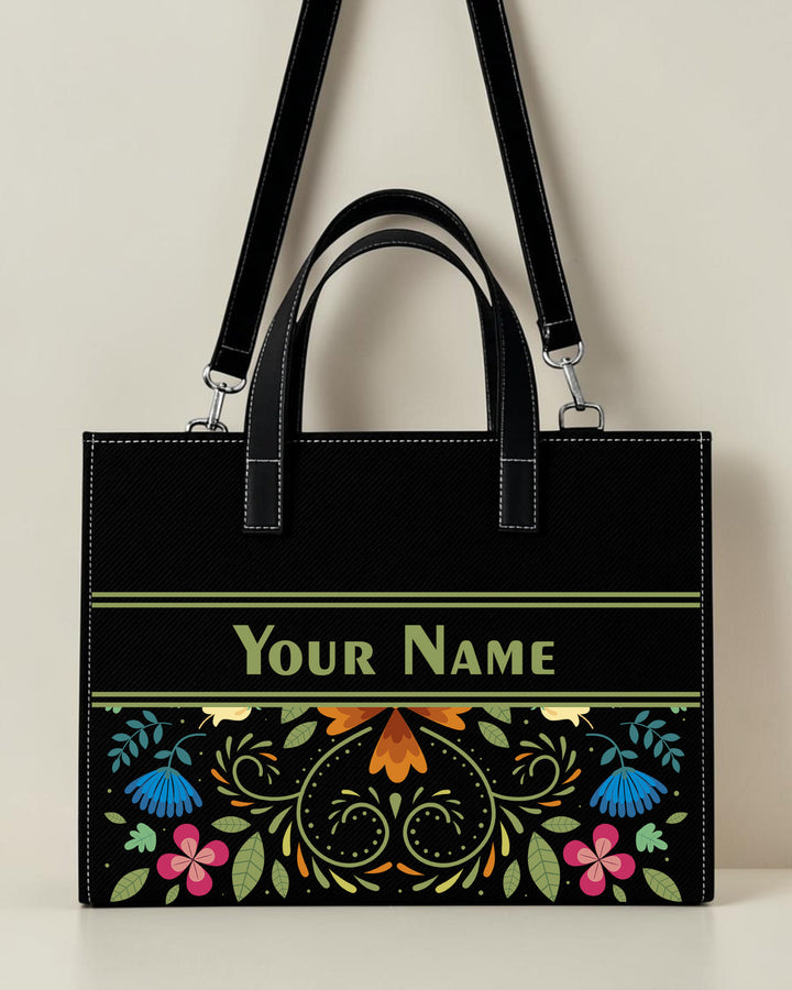 Personalized black folk art sling tote bag with floral print and custom name
