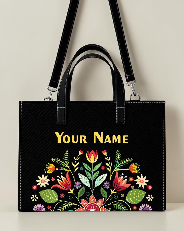 Personalized black folk floral sling tote bag with colorful floral print and custom name