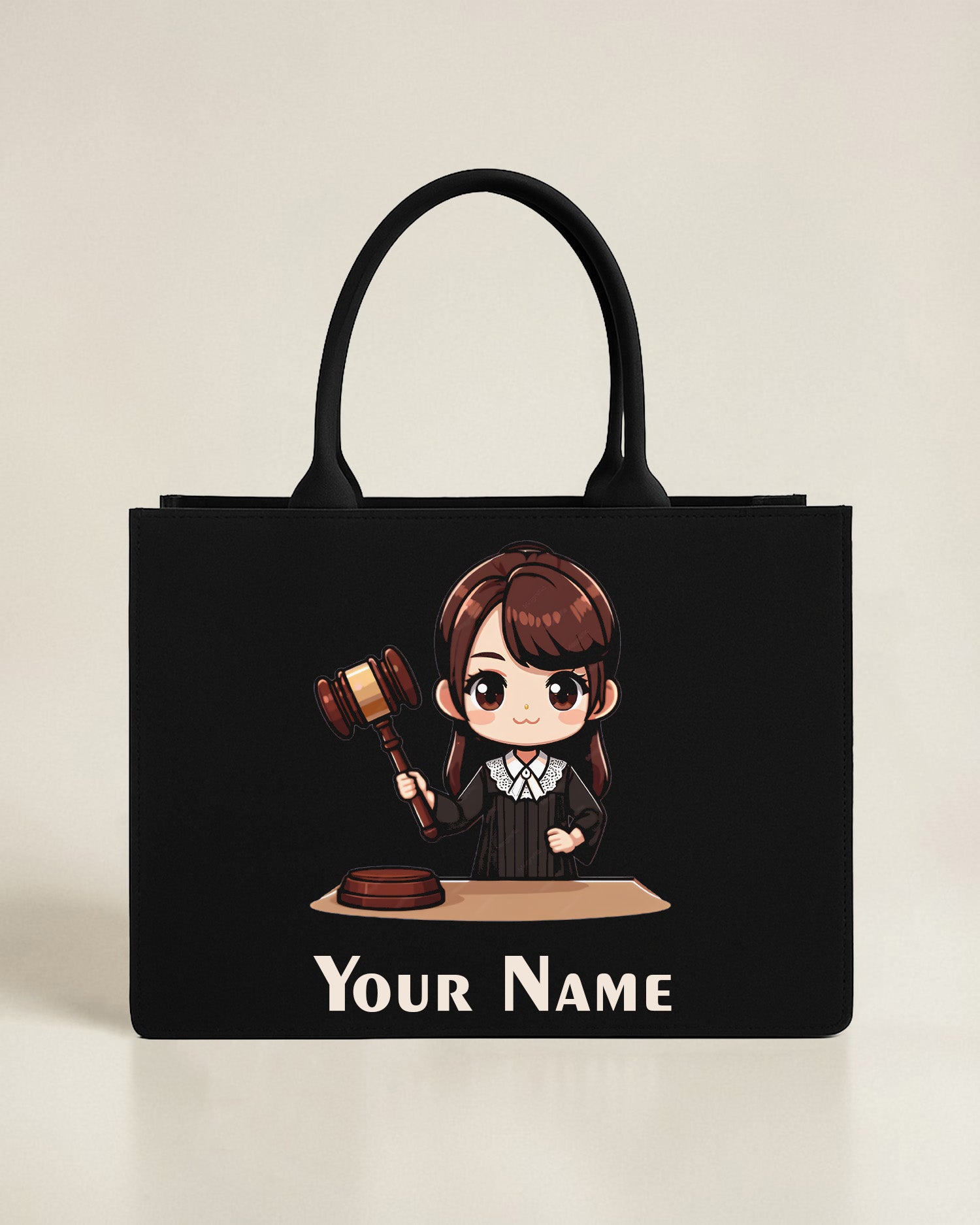 Personalized black tote bag with judge illustration holding a gavel and custom name