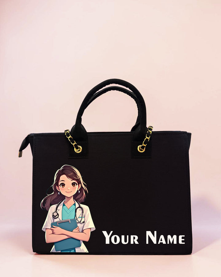 Personalized black tote bag featuring nurse illustration artwork and custom name print on a pastel background.
