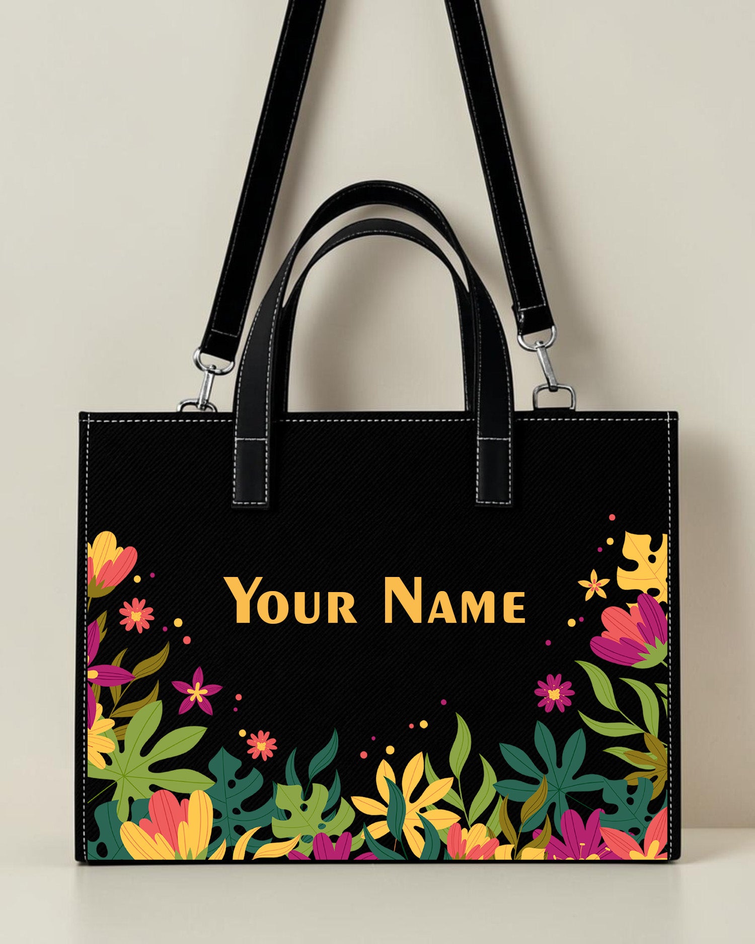 Personalized black tropical floral sling tote bag with colorful flower print and custom name