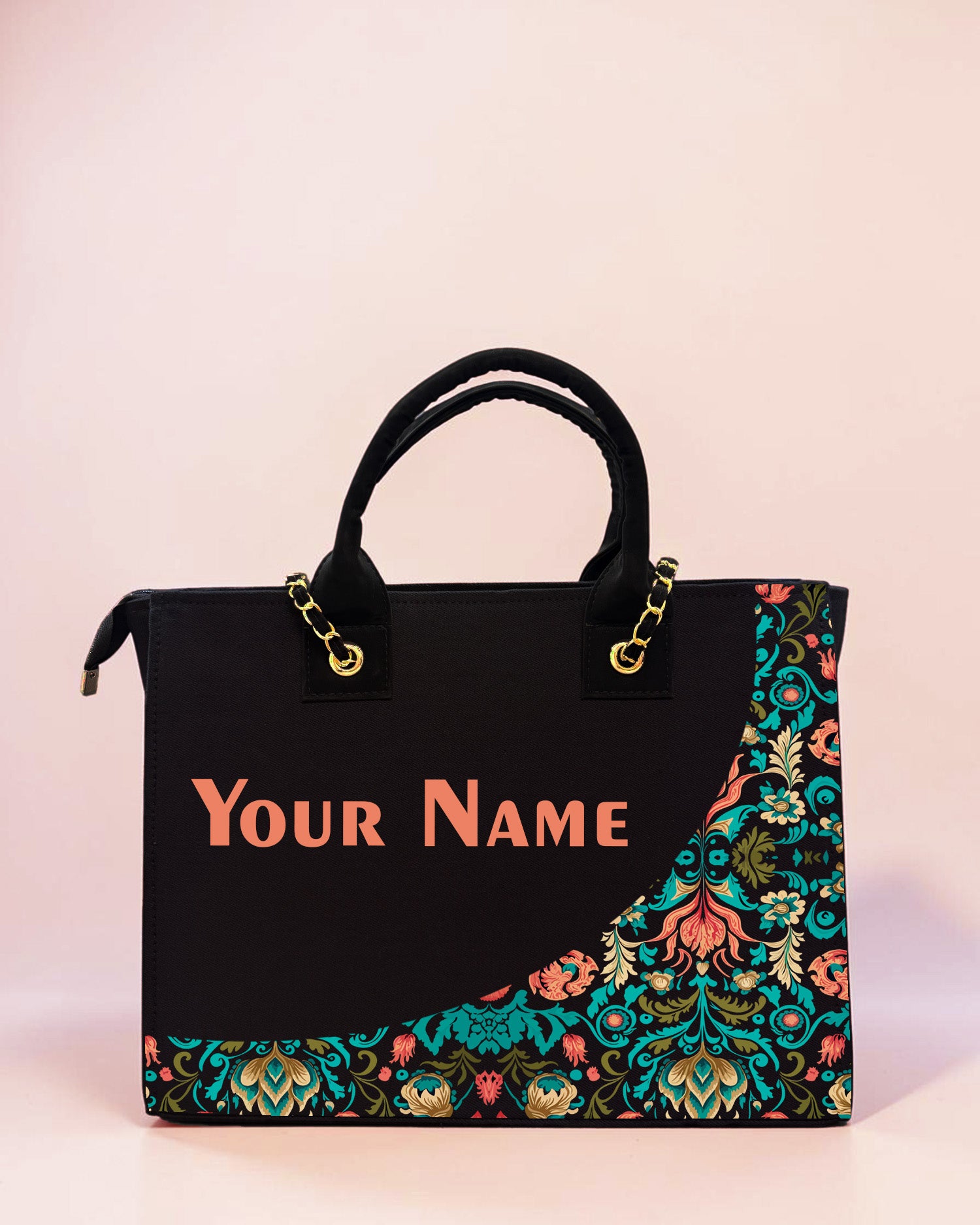 Personalized black tote bag featuring vintage floral artwork and custom name print on a pastel background.
